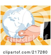 Poster, Art Print Of Caucasian Hand Holding A Blue Globe On A Burst Background