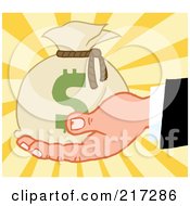 Poster, Art Print Of Caucasian Hand Holding A Money Bag On A Burst Background