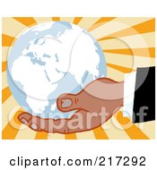 Poster, Art Print Of Black Hand Holding A Blue Globe On A Burst Background