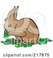 Royalty Free RF Clipart Illustration Of A Hare Eating Leaves by Lal Perera