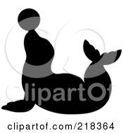 Poster, Art Print Of Black Silhouetted Seal Balancing A Ball On His Nose