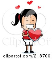 Royalty Free RF Clipart Illustration Of A Happy Girl Proudly Holding A Valentine Heart