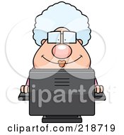Plump Granny Using A Desktop Computer