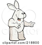 Royalty Free RF Clipart Illustration Of A Rabbit Laughing And Pointing by Cory Thoman