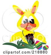 Poster, Art Print Of Yellow Duck Wearing Bunny Ears By Easter Eggs With A Camera