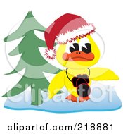 Royalty Free RF Clipart Illustration Of A Yellow Christmas Duck With A Camera By A Christmas Tree