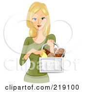 Pretty Blond Woman Carrying A Basket Of Bread