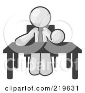 Royalty Free RF Clipart Illustration Of A White Businessman Seated At A Desk Instructing Employees