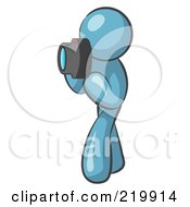 Poster, Art Print Of Denim Blue Man Character Tourist Or Photographer Taking Pictures With A Camera