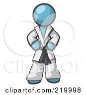 Tough Denim Blue Man In A White Karate Suit And A Black Belt Standing With His Hands On His Hips