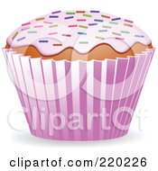 Cupcake With Strawberry Frosting And Colored Springkles
