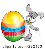 Royalty Free RF Clipart Illustration Of A Happy Easter Bunny By A Shiny Colorful Egg