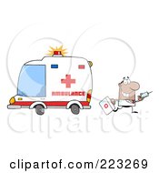 Hispanic Or Black Male Doctor Walking Away From An Ambulance Carrying A Syringe