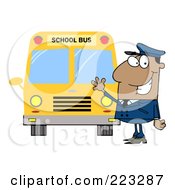 Friendly Black School Bus Driver Waving By A Bus