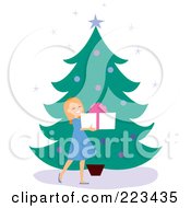 Poster, Art Print Of Happy Girl Holding A Gift Box By A Christmas Tree