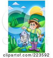 Boy Holding His Fishing Pole And Catch Near A Lake
