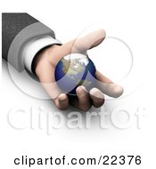 Poster, Art Print Of Businessmans Hand Holding The Earth Symbolizing Protection Opportunity And Security
