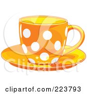 Orange Polka Dot Tea Or Coffee Cup On A Saucer
