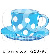 Blue Polka Dot Tea Or Coffee Cup On A Saucer