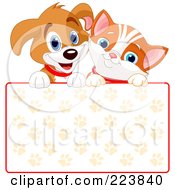 Cute Puppy And Orange Kitten Smiling Over A Paw Print Sign
