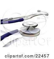 Blue And Silver Vet Or Doc Stethoscope On A White Reflective Counter
