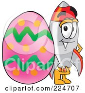Rocket Mascot Cartoon Character With An Easter Egg by Mascot Junction