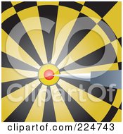 Dart In The Bullseye Of A Yellow And Black Dart Board
