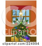 Trimmed Christmas Tree With Presents By A Window