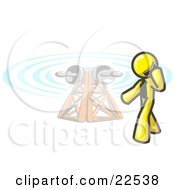 Yellow Businessman Talking On A Cell Phone A Communications Tower In The Background by Leo Blanchette