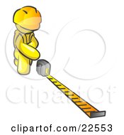 Yellow Man Contractor Wearing A Hardhat Kneeling And Measuring
