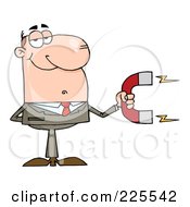 Caucasian Businessman Holding A Strong Magnet