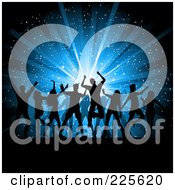 Silhouetted Dancing People Over A Blue Star Burst Christmas Background