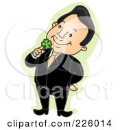 Poster, Art Print Of Happy Businessman Holding A Shamrock To His Face