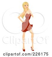 Beautiful Woman Posing In A Red Dress