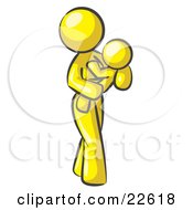 Clipart Illustration Of A Yellow Woman Carrying Her Child In Her Arms Symbolizing Motherhood And Parenting