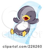 Poster, Art Print Of Cute Baby Penguin On An Ice Slide