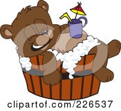 Royalty Free RF Clipart Illustration Of A Bear Cub School Mascot Bathing In A Barrel With A Drink On His Belly