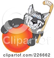 Husky School Mascot Grabbing A Hockey Ball