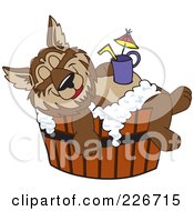 Wolf School Mascot Relaxing In A Tub With A Drink On His Belly