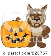 Wolf School Mascot By A Halloween Pumpkin