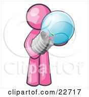 Clipart Illustration Of A Pink Man Holding A Glass Electric Lightbulb Symbolizing Utilities Or Ideas