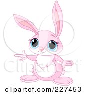 Royalty Free RF Clipart Illustration Of A Cute Pink Bunny Pointing
