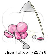 Pink Man Down On The Ground Trying To Blow A Golf Ball Into The Hole by Leo Blanchette