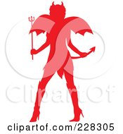 Silhouetted Red Woman In A Devil Halloween Costume