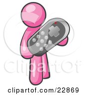 Pink Man Holding A Remote Control To A Television
