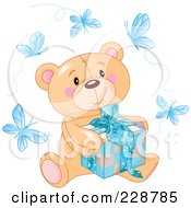 Poster, Art Print Of Teddy Bear Sitting With A Blue Gift Surrounded By Butterflies