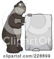 Poster, Art Print Of Ape Holding Up A Stone Sign