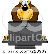 Royalty Free RF Clipart Illustration Of A Lion Using A Desktop Computer