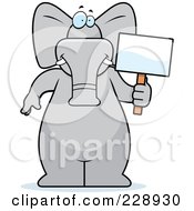 Poster, Art Print Of Elephant Standing With A Blank Sign