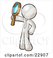 White Man Holding Up A Magnifying Glass And Peering Through It While Investigating Or Researching Something by Leo Blanchette